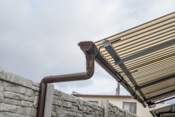Plastic Downspout Installation in Muskegon